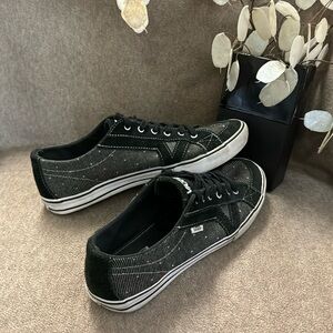 VANS low top shoes in excellent condition. Black suede and light brown. Size 9.5